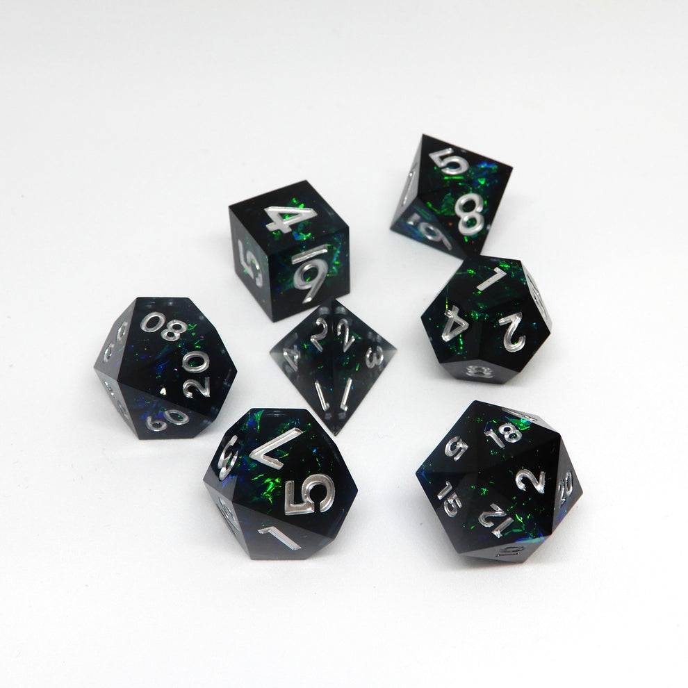 Dark red, purple and gold polyhedral dice styled for a Scorpio rogue